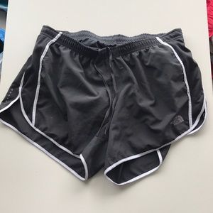 Dark grey north face running shorts size large